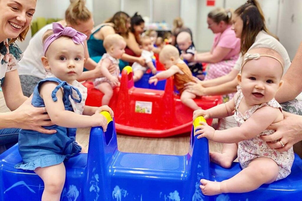 babies-playing-on-seesaw-toys