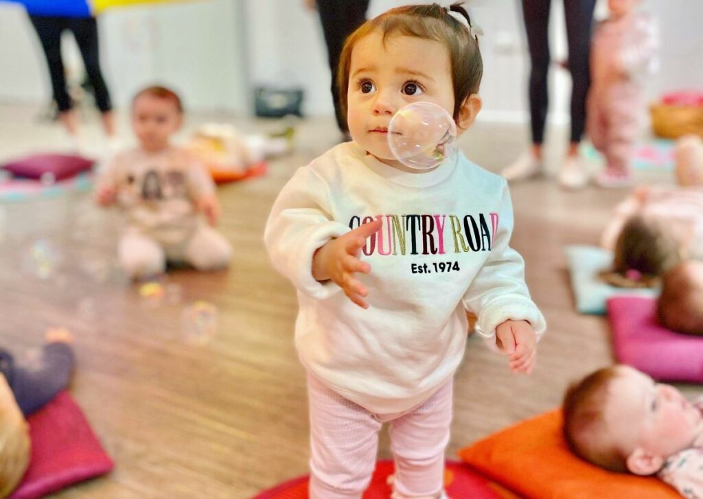 Baby girl in sensory classes for 1 year olds